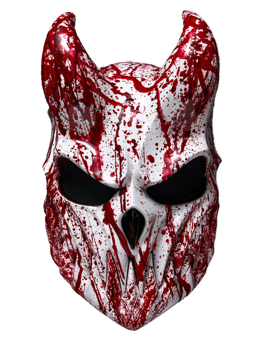 A white horned mask with black eye openings, heavily splattered with red blood-like paint, shown against a plain light gray background.